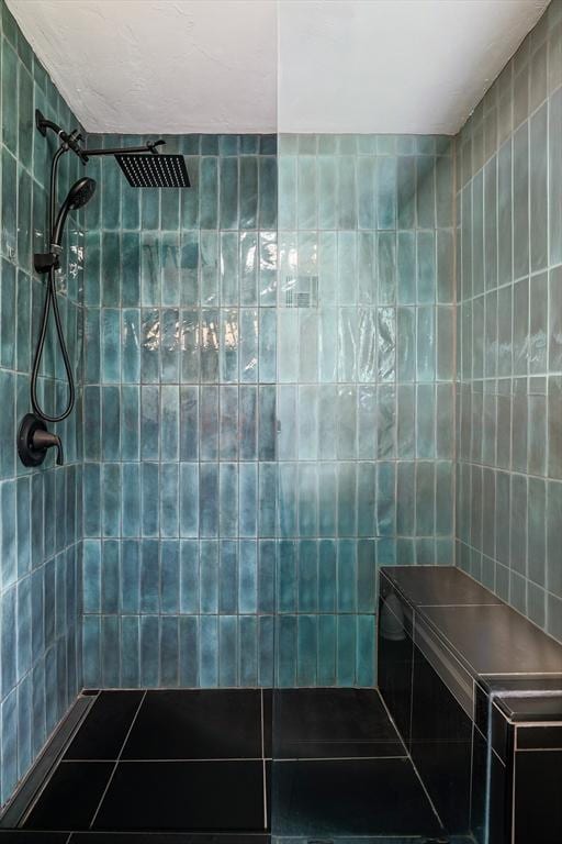 128 Clinton St, Hopkinton, MA 01748 - full bath with tile walls, a tile shower, and tile patterned flooring