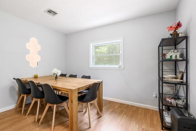 128 Clinton St, Hopkinton, MA 01748 - dining space with light wood finished floors and baseboards