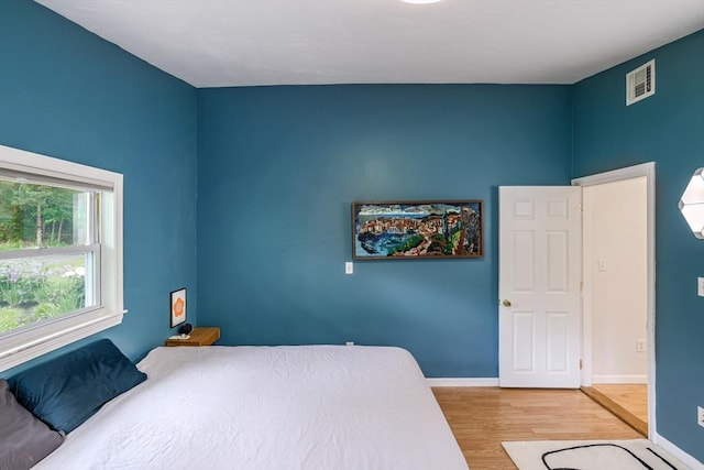128 Clinton St, Hopkinton, MA 01748 - bedroom featuring wood finished floors and baseboards