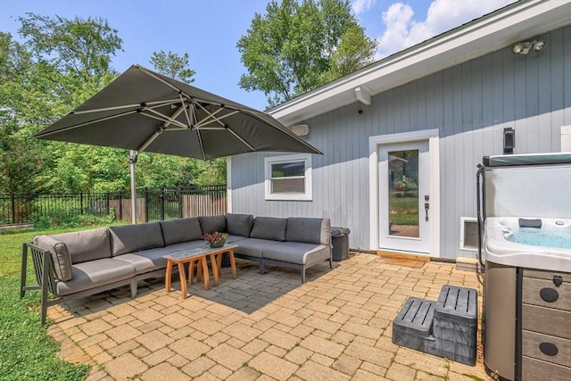 128 Clinton St, Hopkinton, MA 01748 - view of patio / terrace featuring an outdoor living space and a hot tub