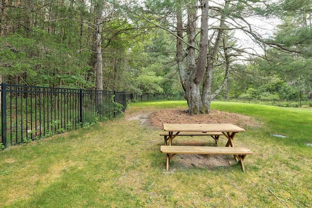 128 Clinton St, Hopkinton, MA 01748 - view of yard with a wooded view