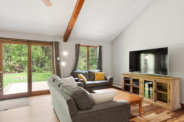 25 Williams Rd, Fitchburg, MA 01420 - living area with a baseboard radiator and light wood-style flooring