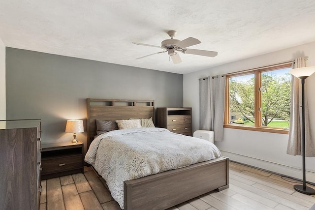 25 Williams Rd, Fitchburg, MA 01420 - bedroom with wood finished floors, a ceiling fan, and baseboards