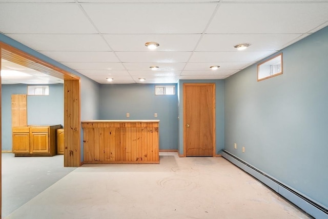 25 Williams Rd, Fitchburg, MA 01420 - indoor dry bar featuring baseboard heating, finished concrete floors, a paneled ceiling, and healthy amount of natural light