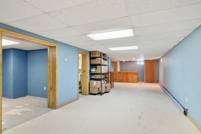 25 Williams Rd, Fitchburg, MA 01420 - finished basement with a baseboard radiator and a drop ceiling