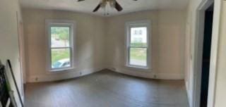 empty room with a ceiling fan