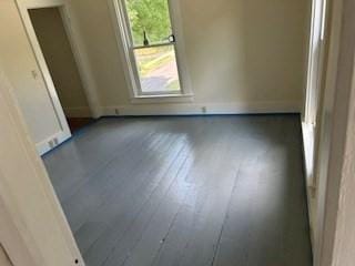 empty room with wood finished floors