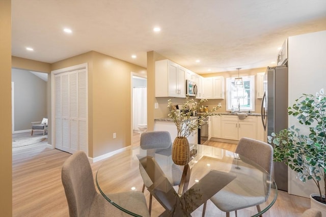 22 Mountain Brook Rd, Sturbridge, MA 01566 - dining room featuring recessed lighting, light wood-style flooring, and baseboards