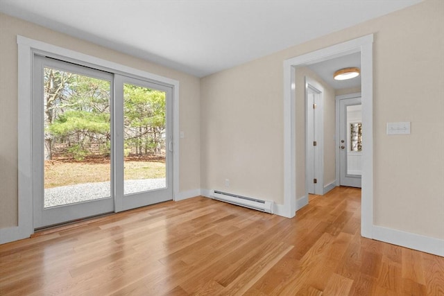 30 Grannys Ln, Orleans, MA 02653 - doorway featuring baseboards, light wood-style floors, and a baseboard radiator