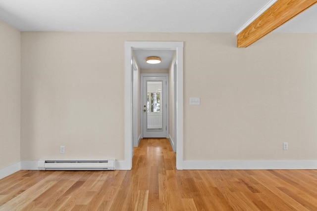 30 Grannys Ln, Orleans, MA 02653 - spare room with light wood finished floors, baseboard heating, and baseboards
