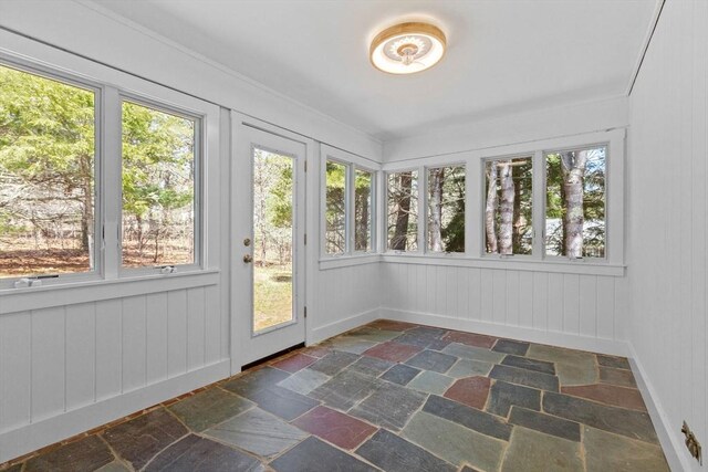 30 Grannys Ln, Orleans, MA 02653 - unfurnished sunroom featuring baseboards and stone finish flooring