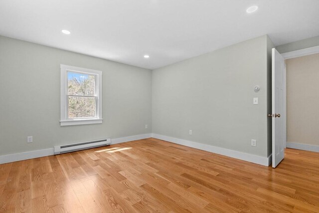 30 Grannys Ln, Orleans, MA 02653 - unfurnished room with a baseboard radiator, recessed lighting, light wood finished floors, and baseboards