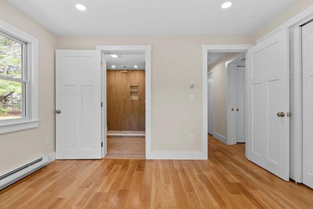 30 Grannys Ln, Orleans, MA 02653 - unfurnished bedroom featuring recessed lighting, light wood finished floors, and baseboard heating