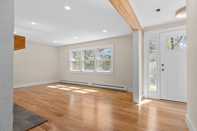 30 Grannys Ln, Orleans, MA 02653 - entryway featuring a baseboard heating unit, recessed lighting, wood finished floors, and baseboards
