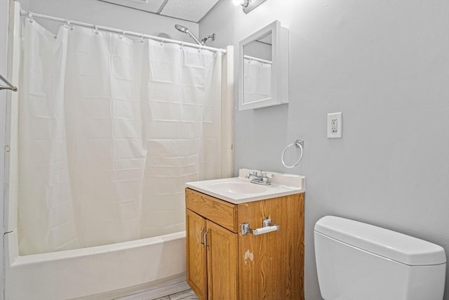 full bathroom featuring hardwood / wood-style flooring, vanity, shower / bathtub combination with curtain, and toilet