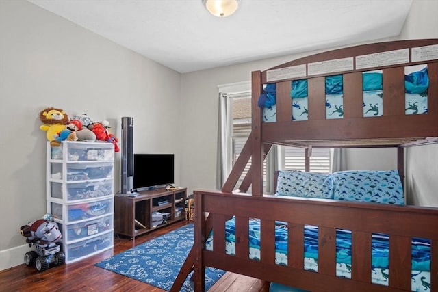 bedroom featuring dark hardwood / wood-style floors