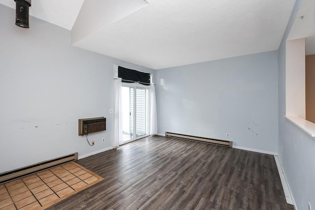 spare room featuring dark hardwood / wood-style flooring, a baseboard radiator, and a wall mounted AC