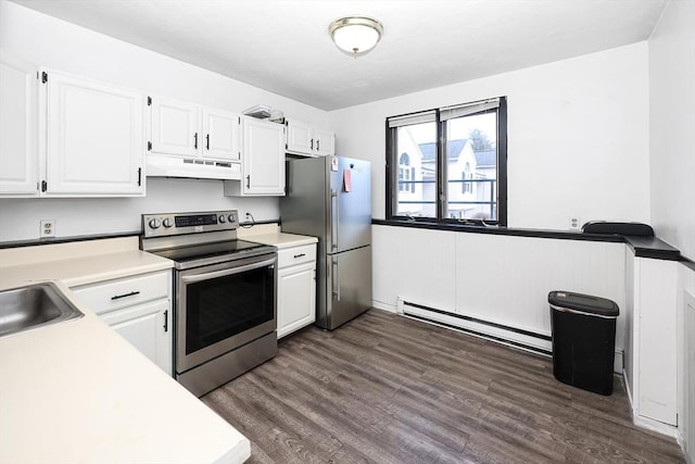 kitchen featuring white cabinetry, sink, stainless steel appliances, and a baseboard radiator