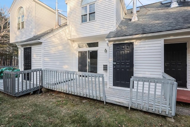 doorway to property with a wooden deck