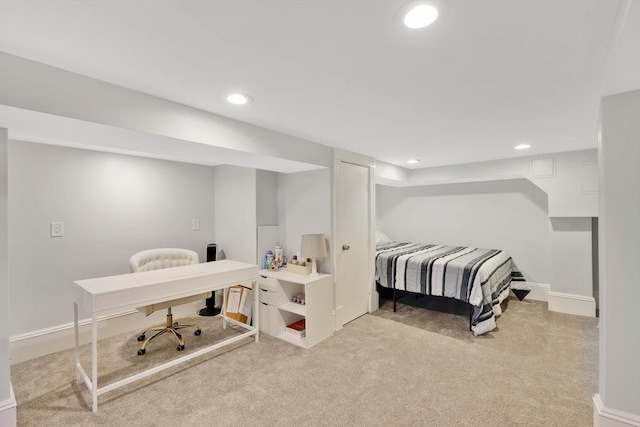 bedroom with recessed lighting, baseboards, and light carpet