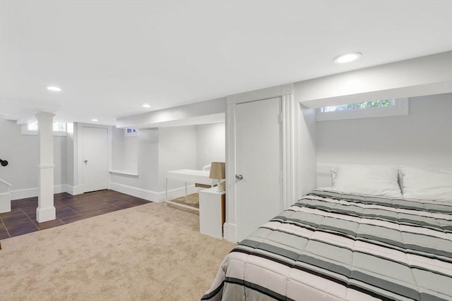 carpeted bedroom with baseboards, tile patterned floors, and recessed lighting