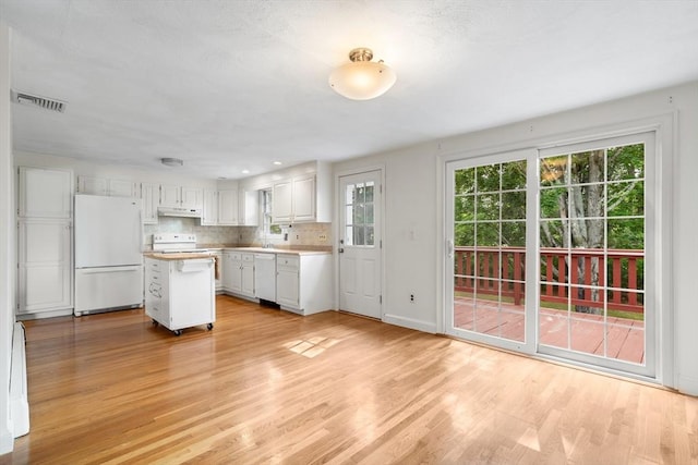 3 Biggar Ave, Wilmington, MA 01887 - kitchen featuring white appliances, under cabinet range hood, light wood-style floors, and light countertops