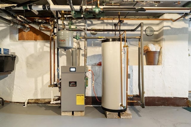 utility room with a heating unit and water heater