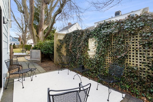 view of patio with fence