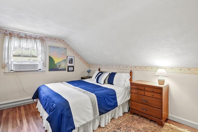 3 Tory Dr, Shrewsbury, MA 01545 - bedroom with baseboards, cooling unit, baseboard heating, vaulted ceiling, and wood finished floors