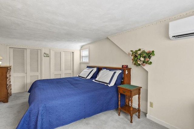 3 Tory Dr, Shrewsbury, MA 01545 - carpeted bedroom with two closets, an AC wall unit, and baseboards