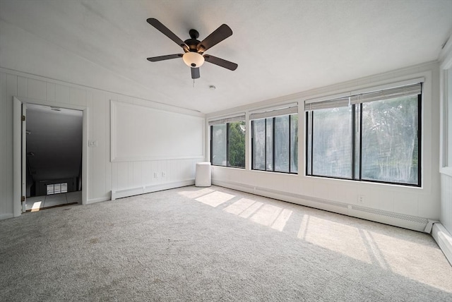 123 Walnut St, Saugus, MA 01906 - carpeted empty room featuring a decorative wall, ceiling fan, baseboard heating, and lofted ceiling