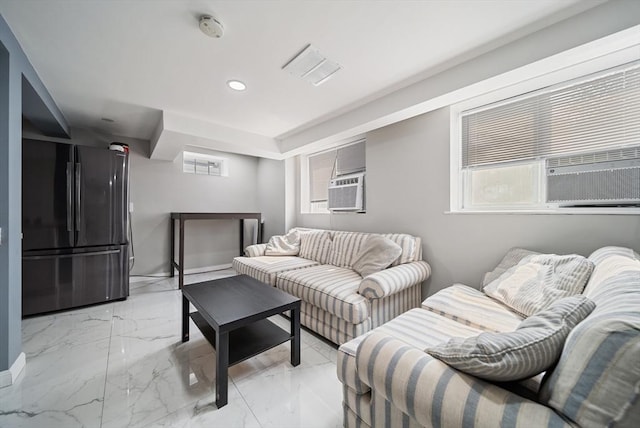 123 Walnut St, Saugus, MA 01906 - living area featuring a wall unit AC, recessed lighting, and light marble finish flooring