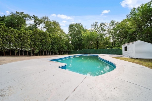 123 Walnut St, Saugus, MA 01906 - view of pool with a patio, view of scattered trees, and a storage shed