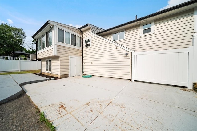 123 Walnut St, Saugus, MA 01906 - back of property with a patio