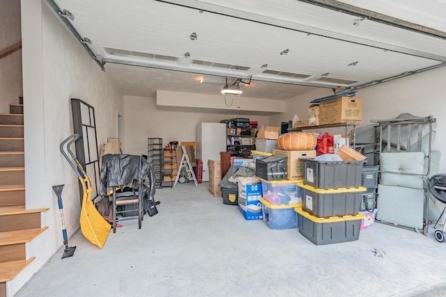 garage featuring a garage door opener