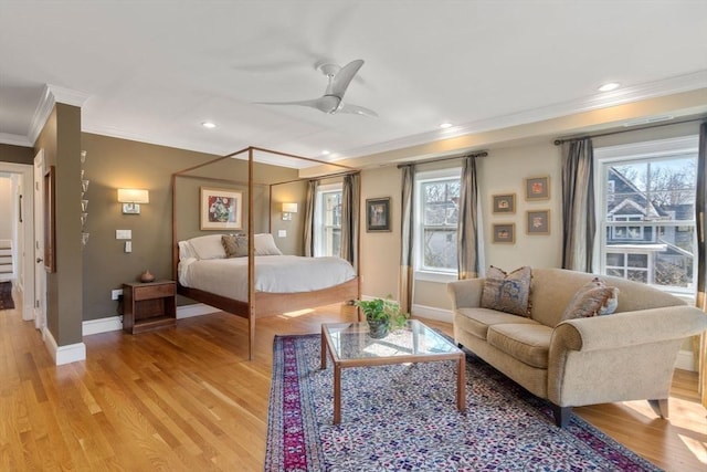 bedroom with recessed lighting, baseboards, light wood-style flooring, and ornamental molding