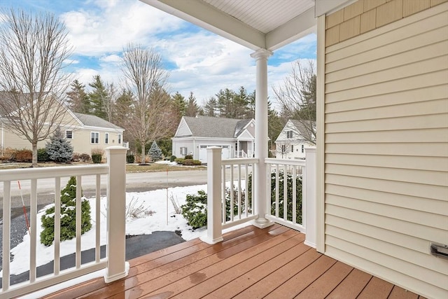 wooden deck featuring covered porch