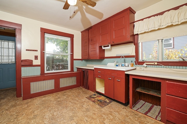 kitchen with ceiling fan and sink