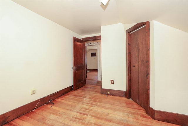 spare room featuring light hardwood / wood-style floors