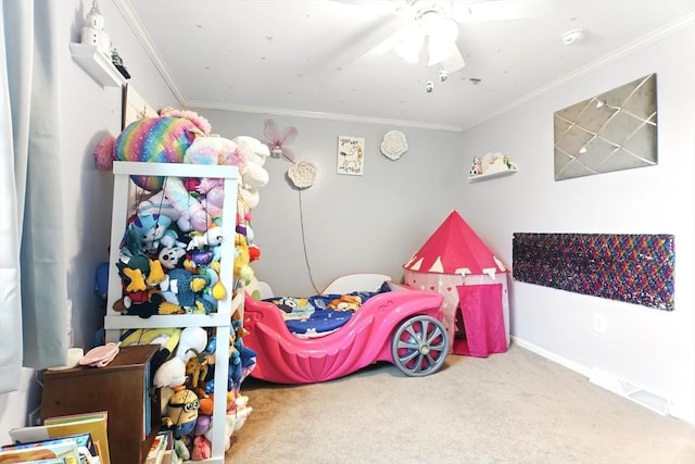 bedroom featuring carpet, crown molding, a ceiling fan, and baseboards