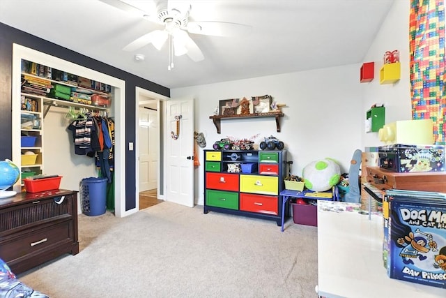 bedroom with carpet flooring, a closet, and ceiling fan