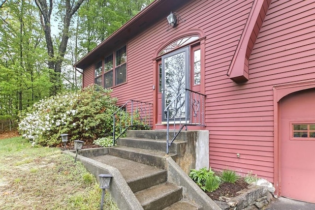 property entrance featuring a garage