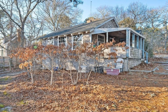 view of property exterior with a chimney