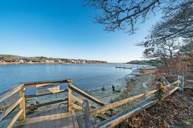 view of dock with a water view