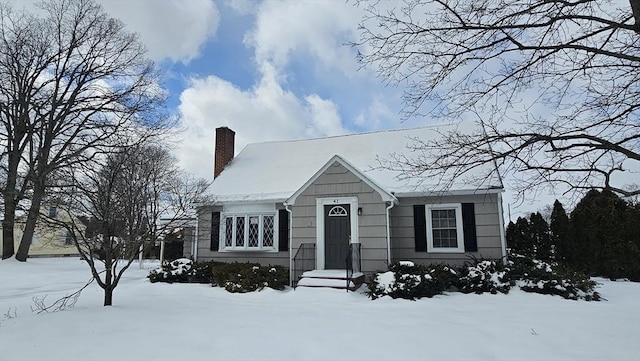 view of front of property featuring a chimney