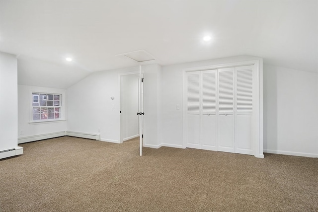 bonus room featuring carpet, vaulted ceiling, and baseboard heating