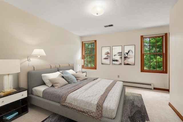 100 Avery Heights Dr, Holden, MA 01520 - carpeted bedroom with a baseboard radiator and multiple windows