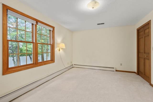 100 Avery Heights Dr, Holden, MA 01520 - unfurnished bedroom with a baseboard radiator and light colored carpet