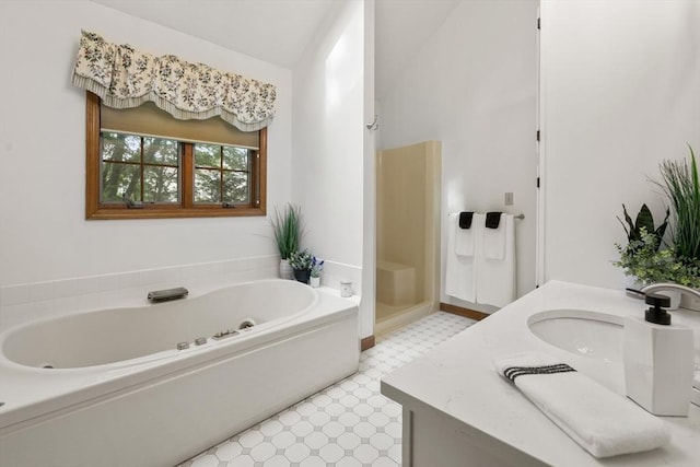 100 Avery Heights Dr, Holden, MA 01520 - full bath featuring tile patterned floors, a garden tub, vanity, a stall shower, and lofted ceiling