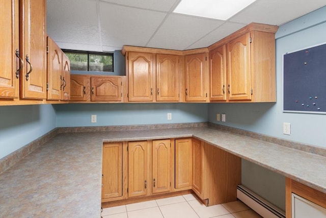 100 Avery Heights Dr, Holden, MA 01520 - kitchen featuring a baseboard radiator, brown cabinets, and light countertops
